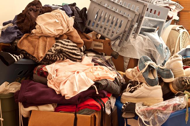 4- Pile of misc items stored in an unorganized fashion in a room